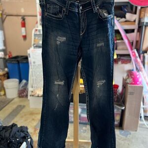 Women's Distressed Blue Jeans